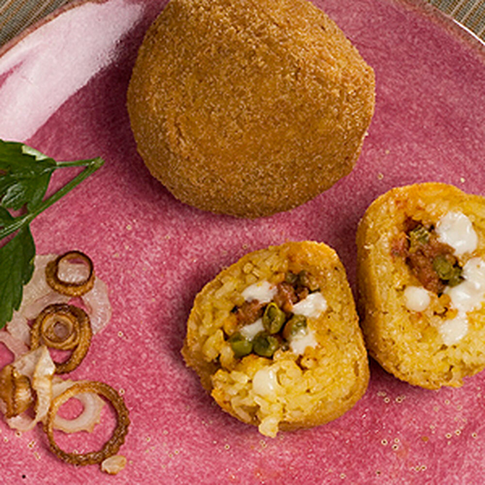 Arancini Di Riso Rice Balls Recipe Sur La Table Arancini ( or arancini di riso ) are stuffed rice balls coated with breadcrumbs, and fried. arancini di riso rice balls recipe