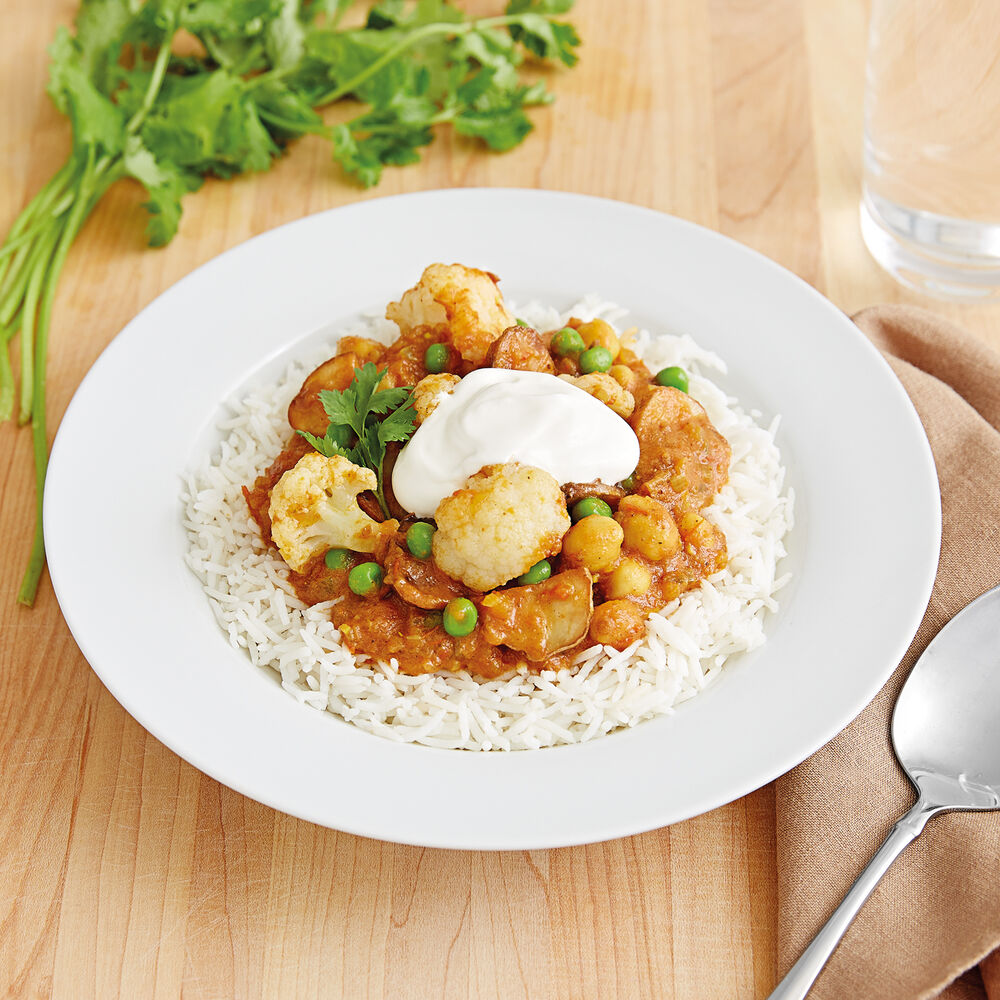 Indian Curry with Potatoes, Cauliflower, Peas and Chickpeas Recipe