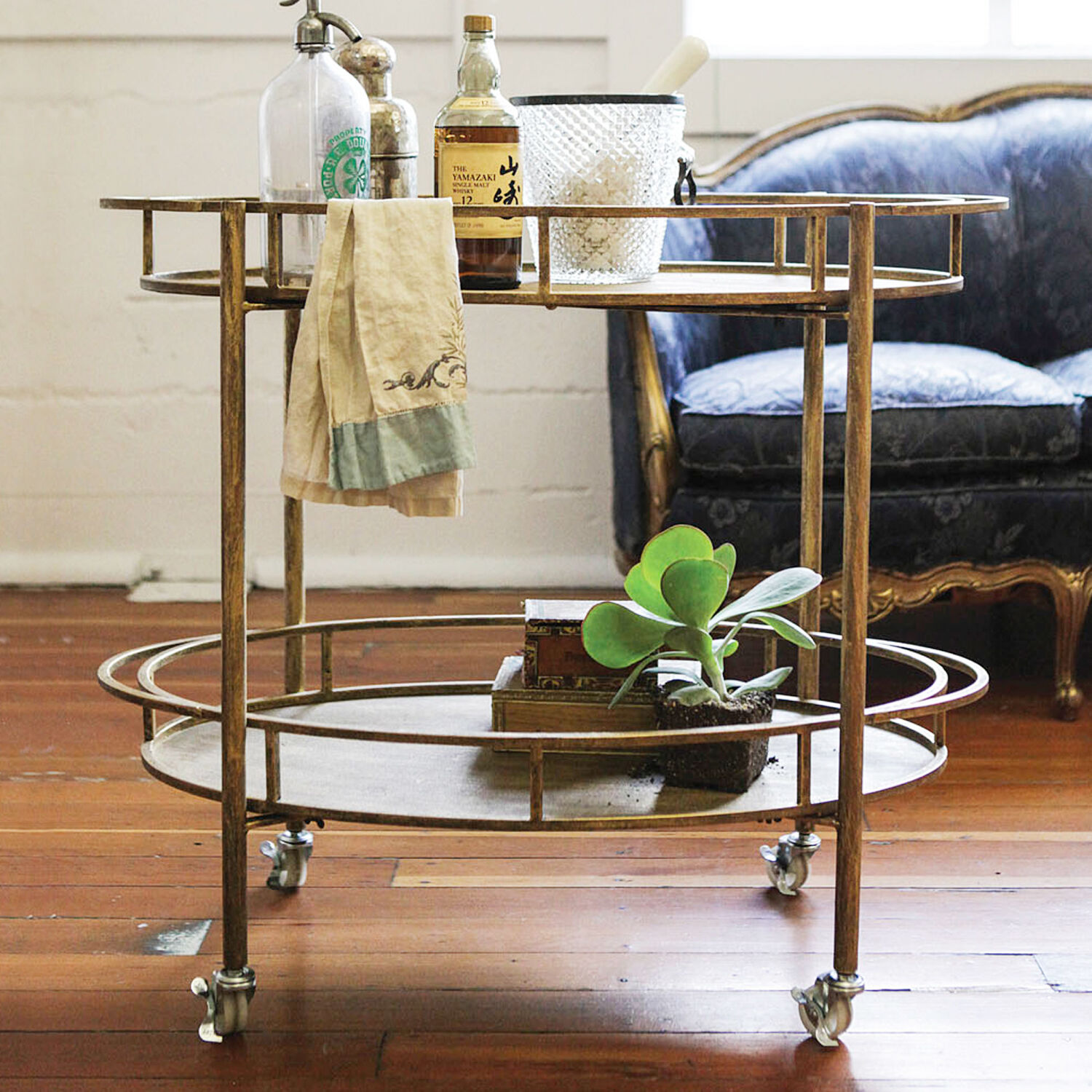 Black Creative Co-op Metal 2-Tier Clover Shaped Bar Cart on Caster Wheels Cabinets and Shelf Units
