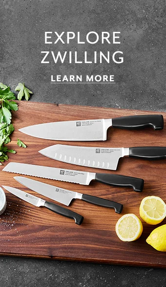 Explore Zwilling. Learn More. Zwilling knives on cutting board.