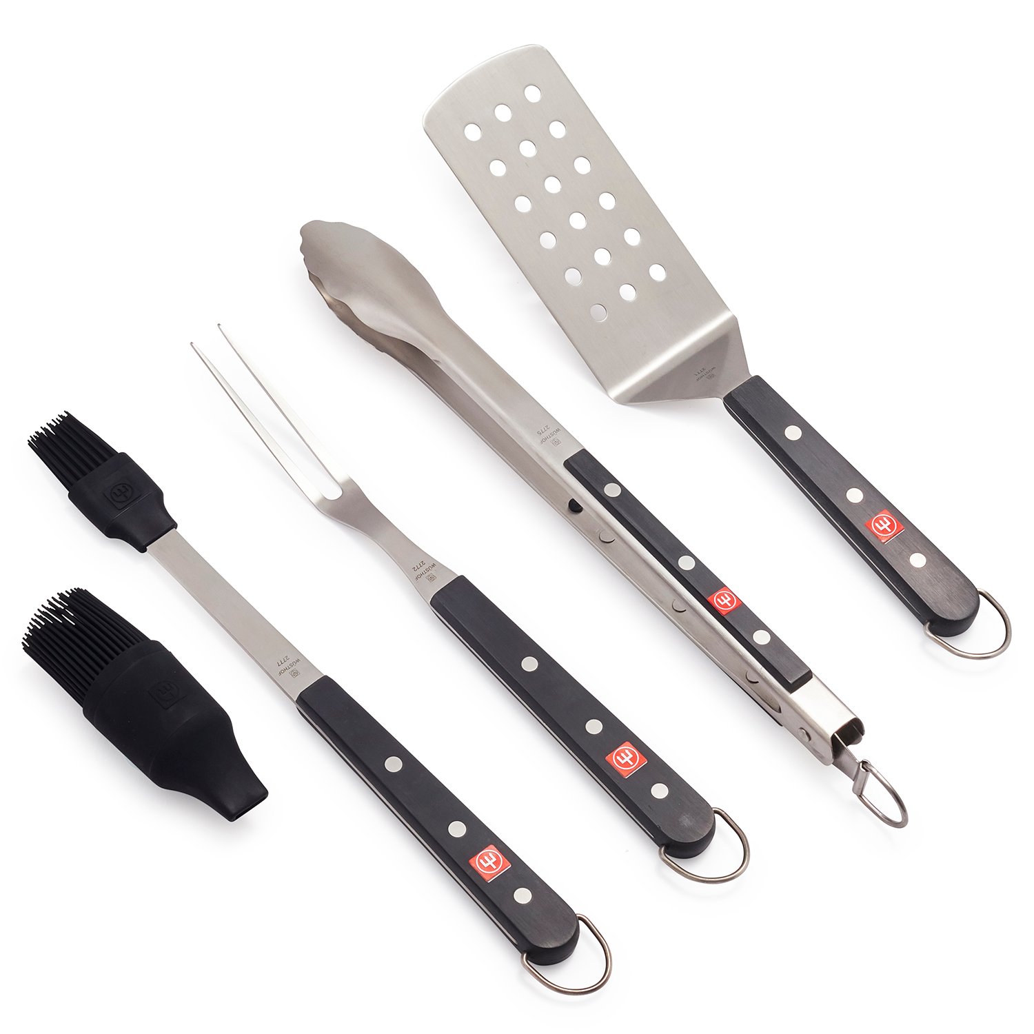 a turner, fork, brush and tongs bbq essentials set