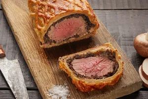 Beef Wellington on cutting board