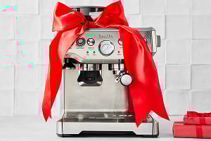 Breville Barista Express Espresso Machine with red bow
