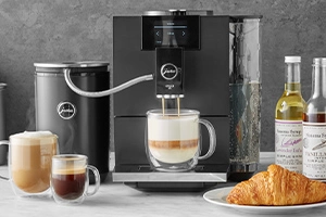 New Jura Ena 8 Metropolitan Black Automatic coffee machine making capuccino
