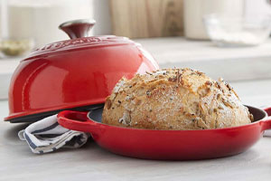 Le Creuset Enameled Cast Iron Bread Oven in red
