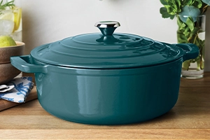 Sur La Table cast iron Dutch oven in dark teal, Private Label Sale up to 60% off.