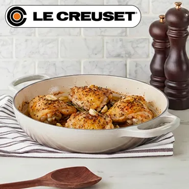 Classic Herb Roasted Chicken in a cast iron Le Creuset buffet pan
