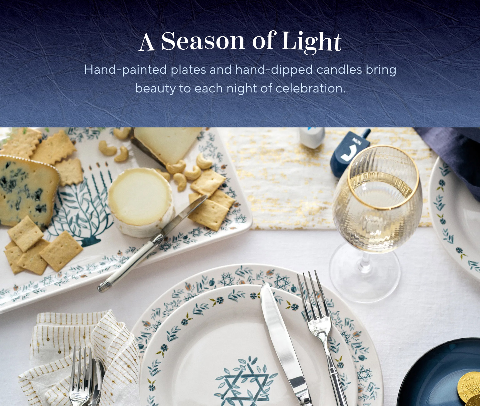 A Season of Light. Hand-painted plates and hand-dipped candles bring beauty to each night of celebration.