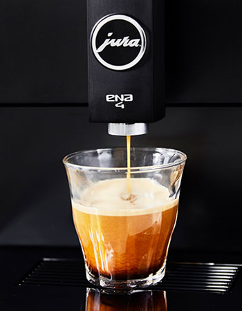 coffee brewing into glass