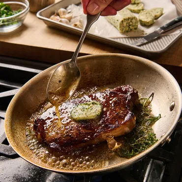 Strip Steak with Chianti Pan Sauce in skillet