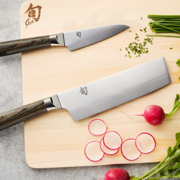 Shun Kagerou Nakiri and Paring Knife Set on cutting board with radishes