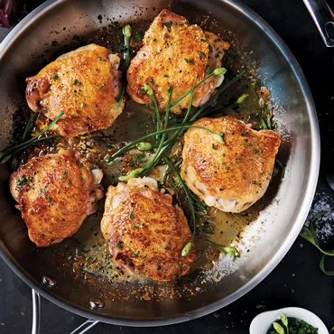 Crispy Chicken Thighs in skillet