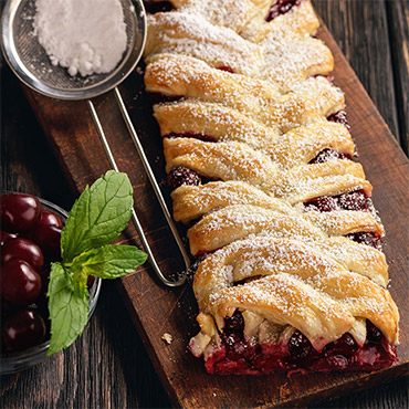 Braided Fruit Pastry dusted with powdered sugar