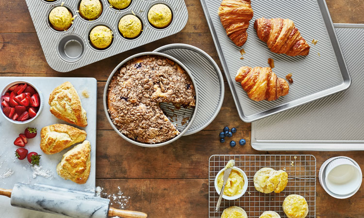 Sur La Table bakeware with muffins, cake and croissants
