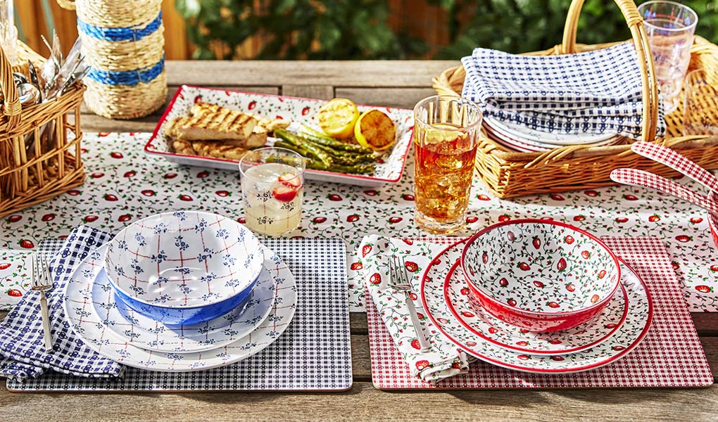 Red and white outdoor dinnerware with strawberries, blue and white outdoor dinnerware