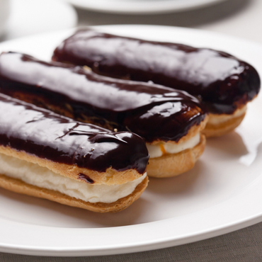 Chocolate Eclairs filled with pastry cream