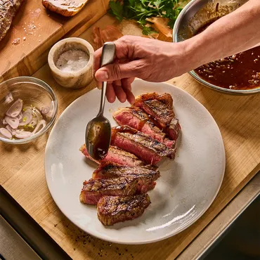 Steak with Chianti Pan Sauce on white plate