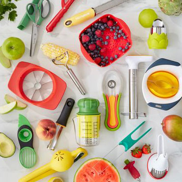 Fruit and Veggie Tools with fresh corn, berries and artichokes