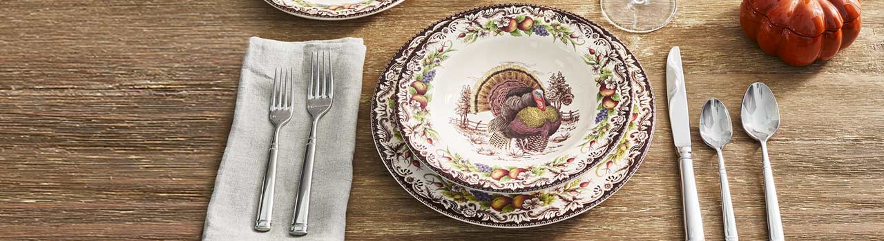 Dinnerware with fall turkey and fruit motif
