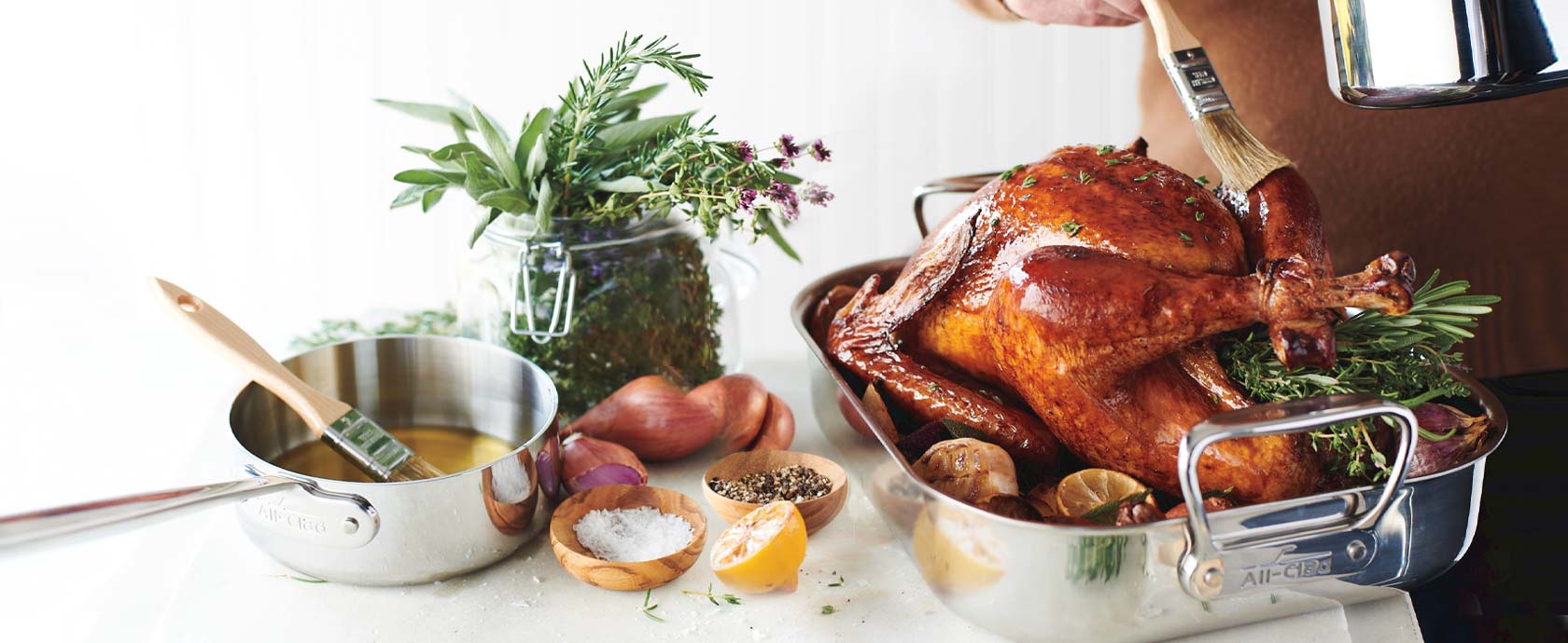 Chef basting roasted turkey