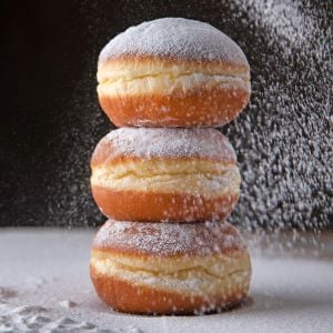 Classic Glazed Donuts with powdered sugar