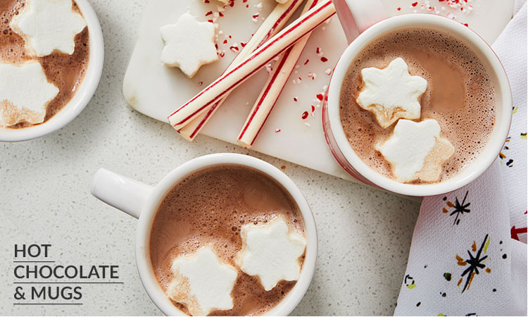 Hot chocolate in mugs with snowflake marshmallows