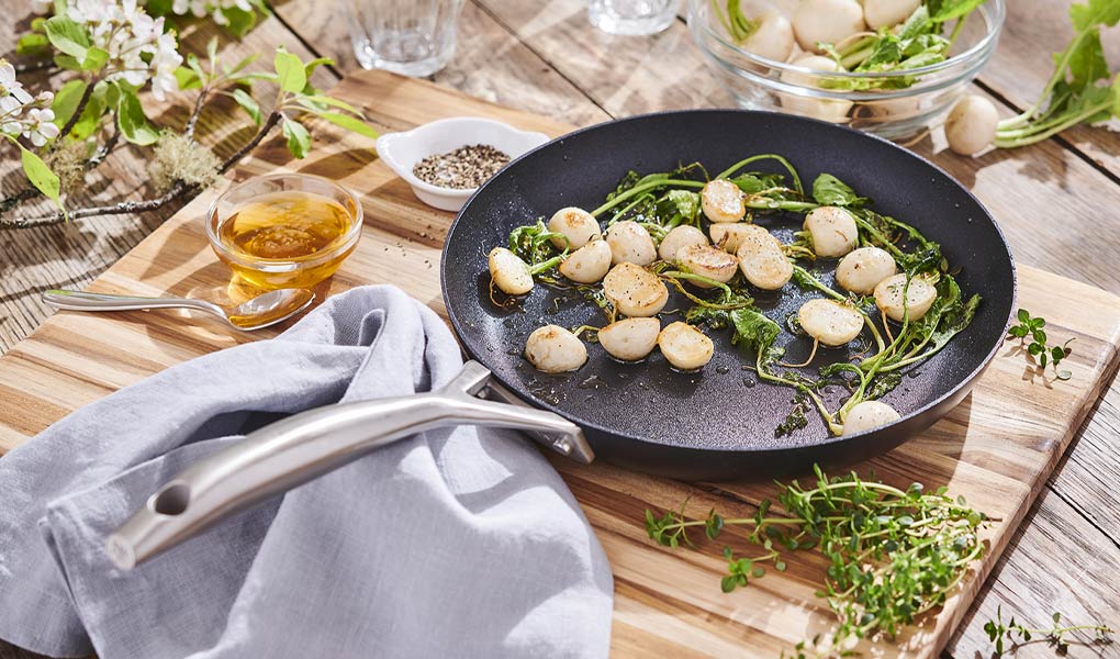 Scanpan nonstick skillet with fresh radishes and herbs