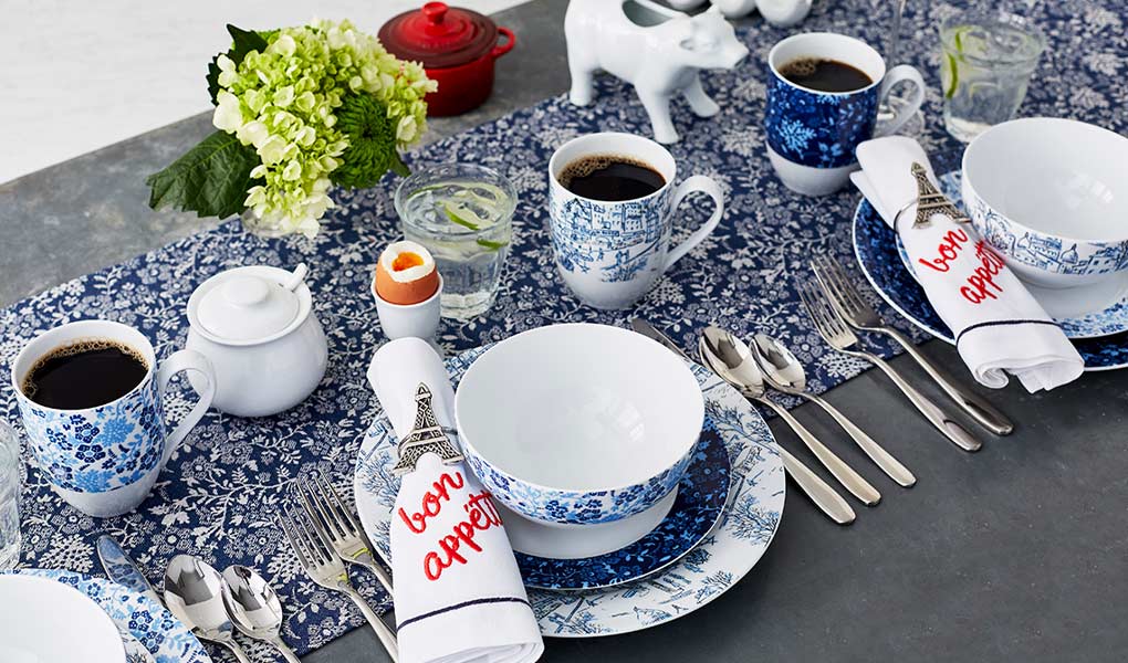 Maison blue and white floral dinnerware and linens