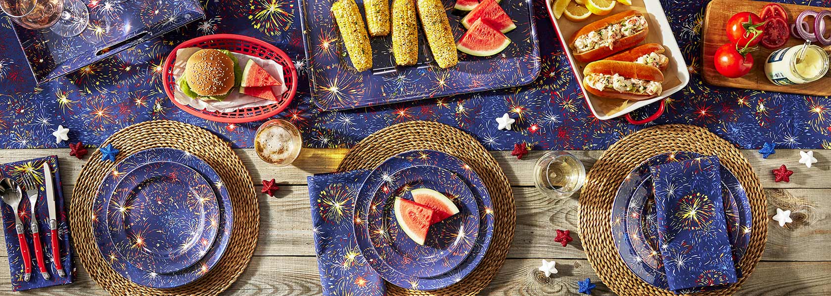 Melamine outdoor dinnerware and linens with fireworks motif