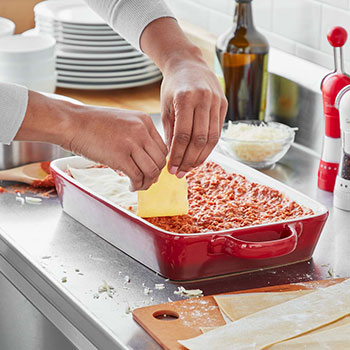 Chef making lasagna