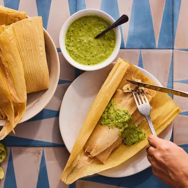 Shredded Pork Tamales with Green Mole Sauce