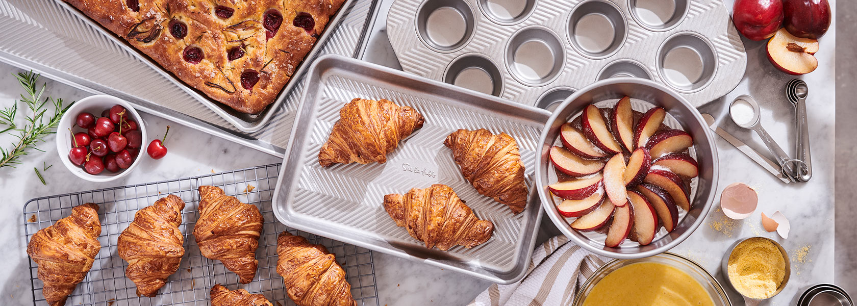 Sur La Table bakeware with fresh croissants