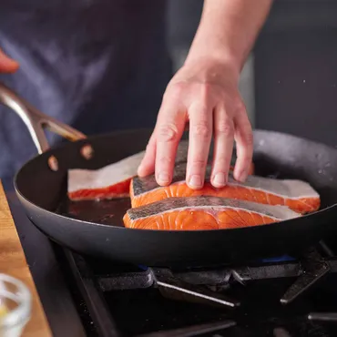 Seared Salmon in skillet with Honey Miso Butter