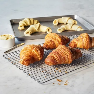 Sur La Table Platinum Pro Half Sheet Pan & Nonstick Cooling Rack Set with croissants