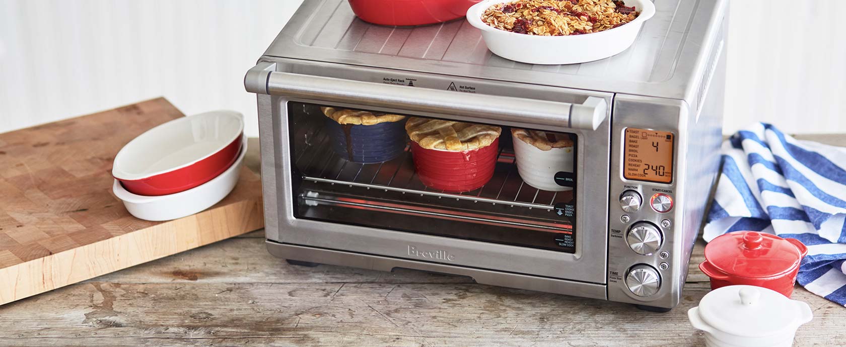 Breville Smart Oven Pro with blue, red and white ramekins