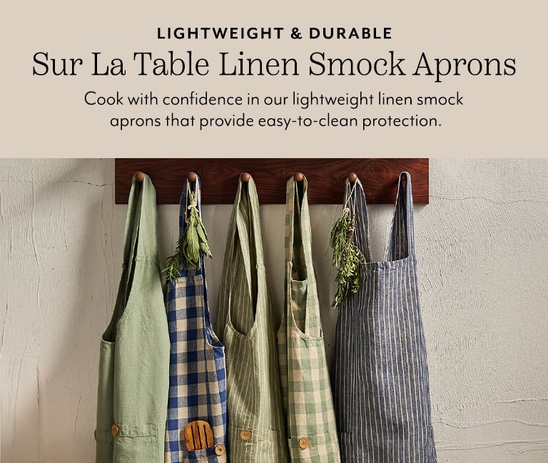 Lightweight and durable Sur La Table smock aprons. Cook with confidence in our lightweight linen smock aprons that provide easy-to-clean protection.