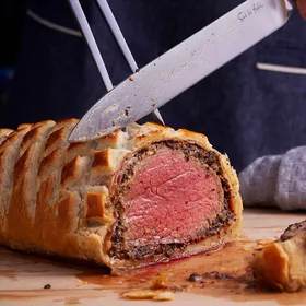 Beef Wellington being sliced