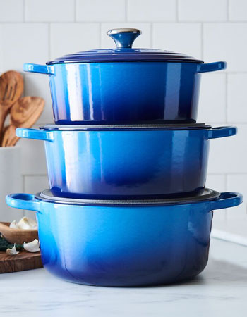 Le Creuset cookware stacked in Azure blue color