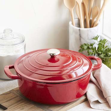Sur La Table Cast Iron Round Wide Covered Dutch Oven, 7 qt. in red