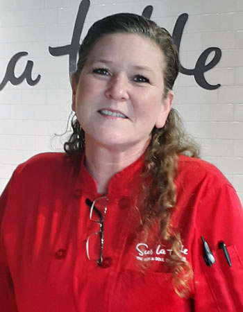 KATE M.