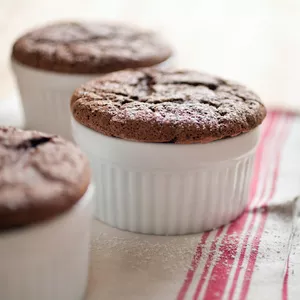chocolate souffle in white ramekin