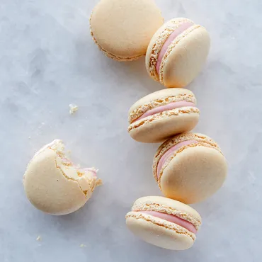 Classic vanilla French Macarons with pink filling
