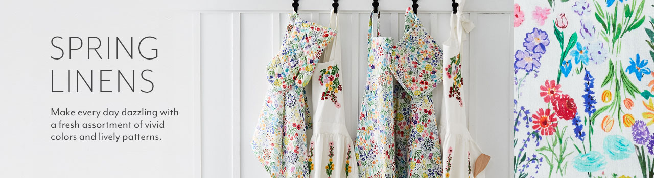 Floral aprons and oven mitts. Spring Linens. Make every day dazzling with a fresh assortment of vivid colors and lively patterns.