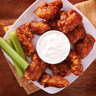 chicken wings and veggie sticks