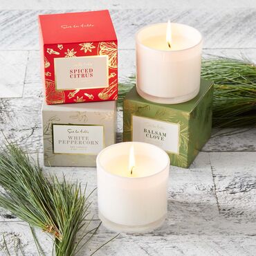 Sur La Table holiday scented candles, spiced citrus, balsam clove and white peppercorn
