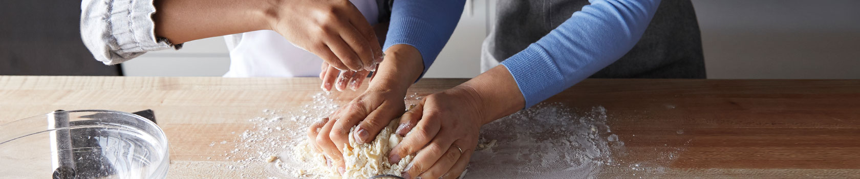 two chefs making biscuits