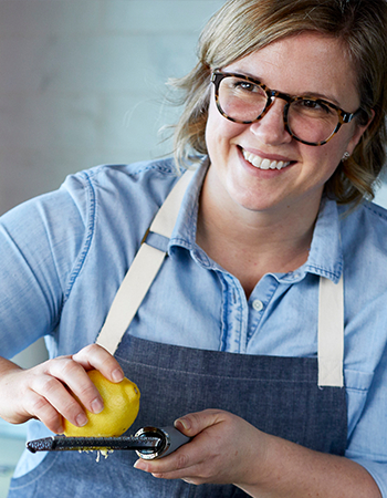 Chef Meredith zesting lemon