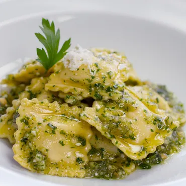 Butternut Squash Ravioli with Arugula Walnut Pesto