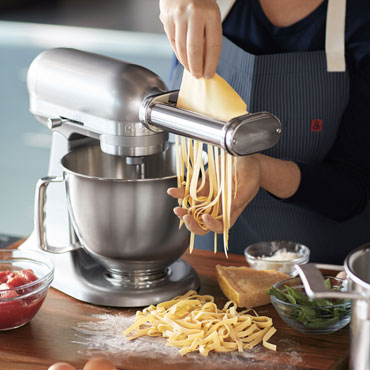 Chef Making Fresh Linquine Pasta Noodles
