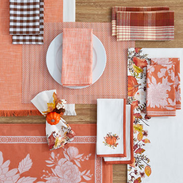 Autumn colored napkins, placemats and table runner linens